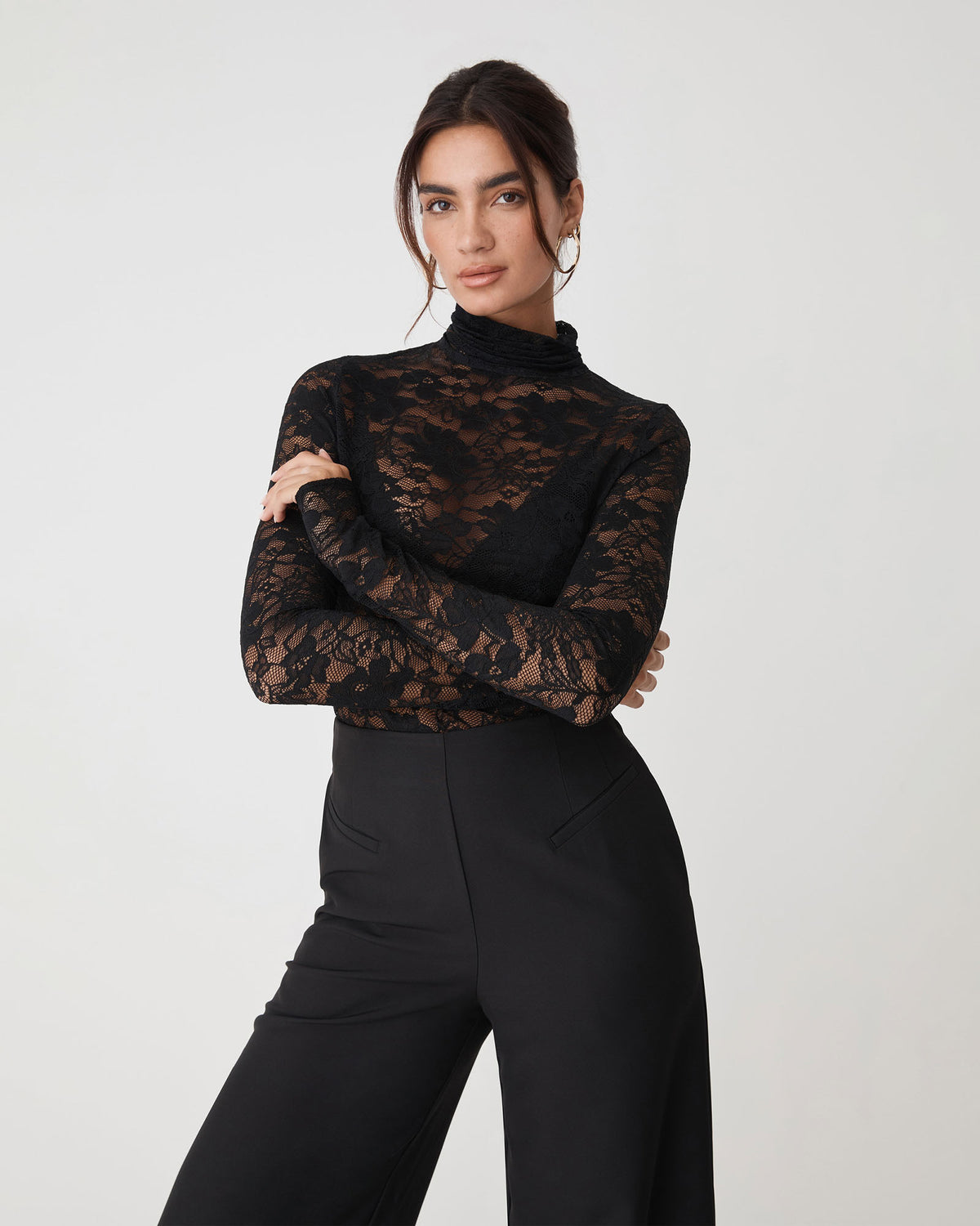 Torin Lace Turtleneck Top in black — close-up view