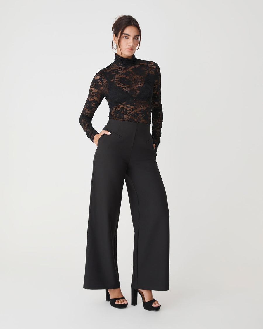 Torin Lace Turtleneck Top in black — full-length view