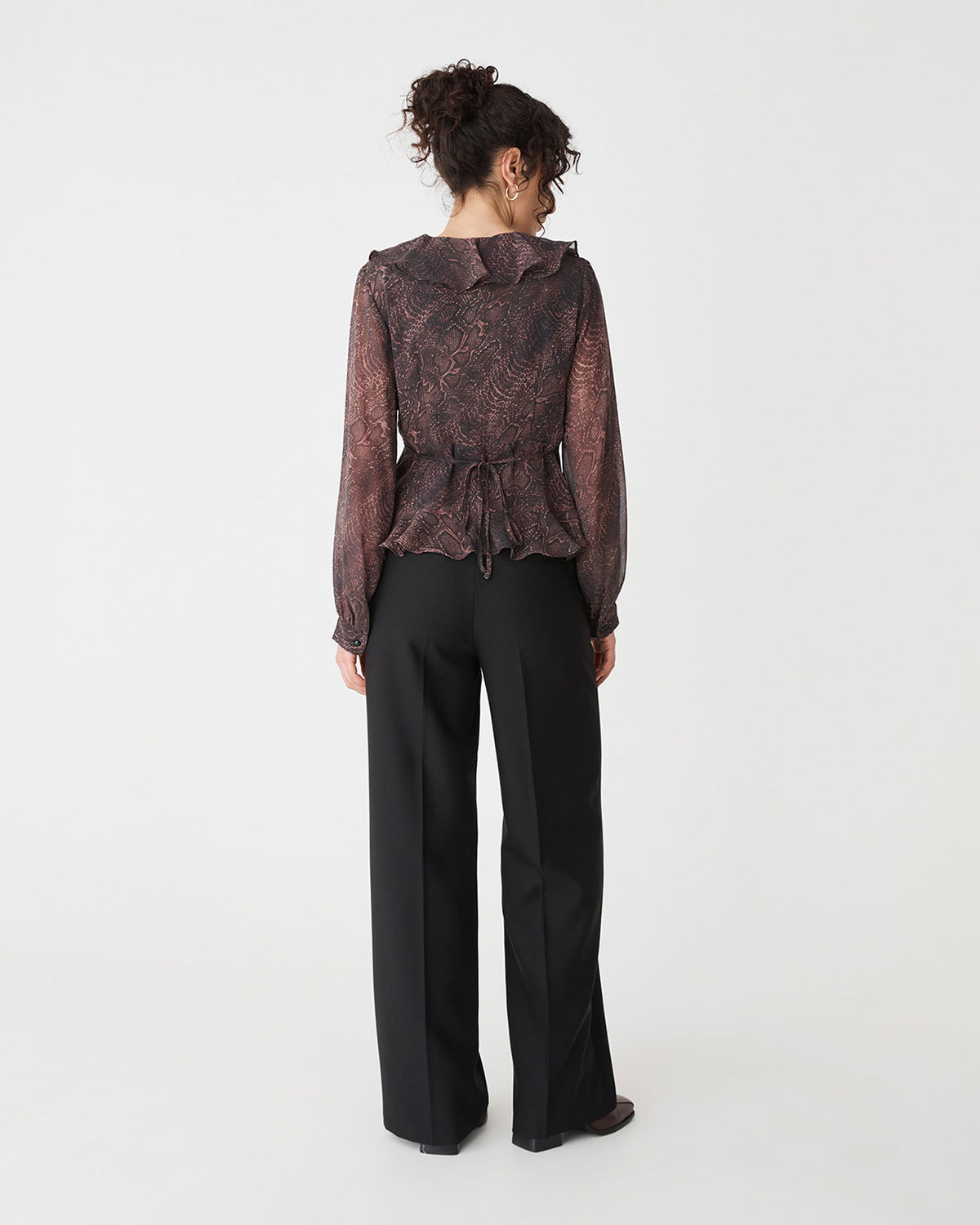 Sonia V-Neck Ruffle Top in brown snake — back view