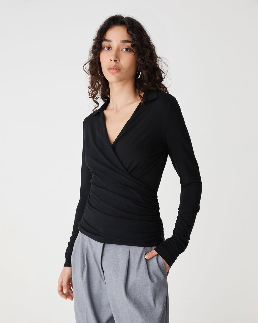 Solene Bamboo Wrap Top in black — close-up view