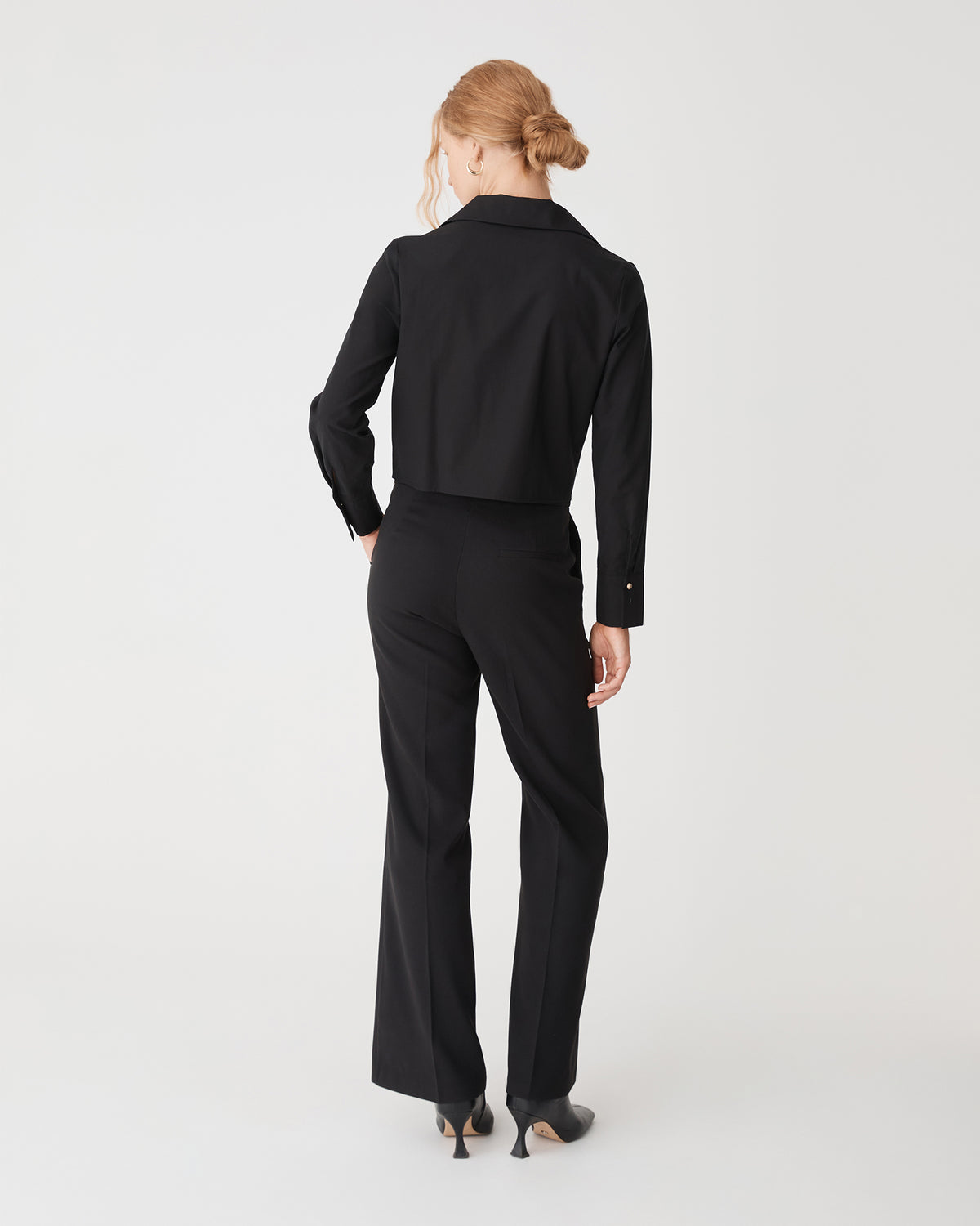 Gabby Pleated Hem Shirt in black — back view