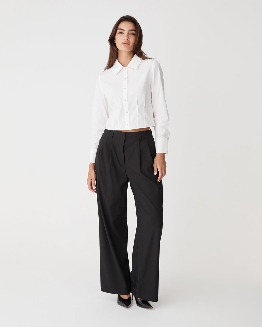 Gabby Pleated Hem Shirt in white — full-length view