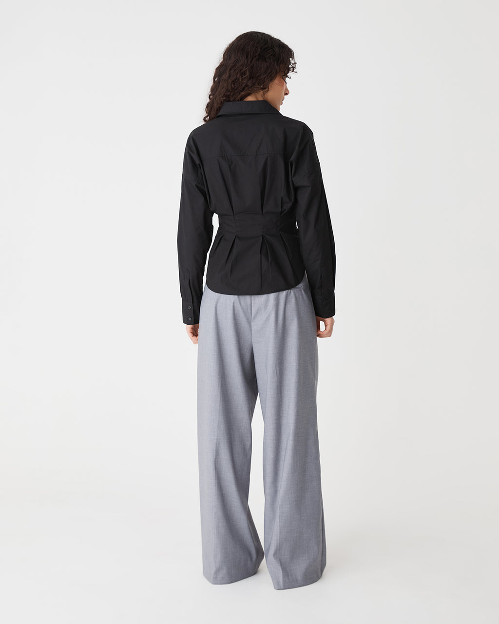 Billie Pleat Waist Shirt in black — back view