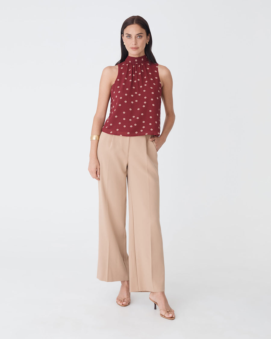 Lottie Printed Tie Neck Top in deep red spot — full-length view