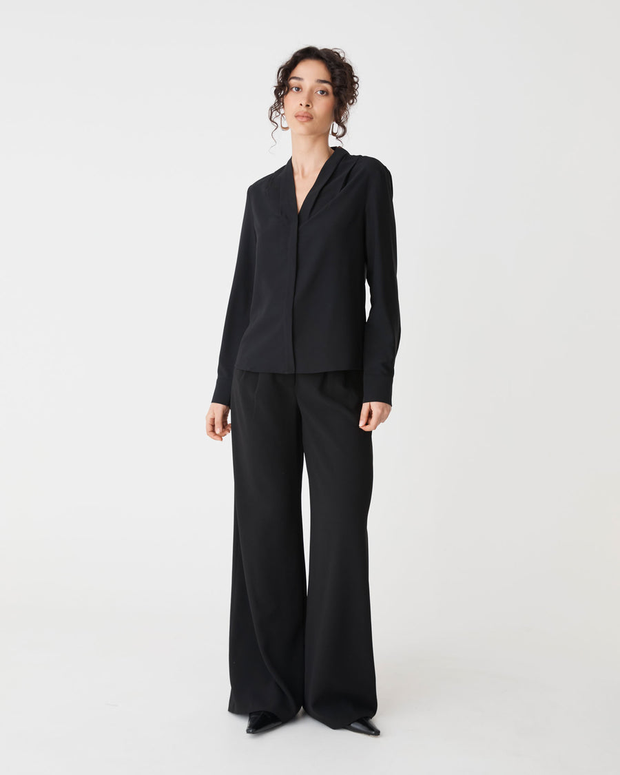 Claudia Pleat Neck Blouse in black — full-length view