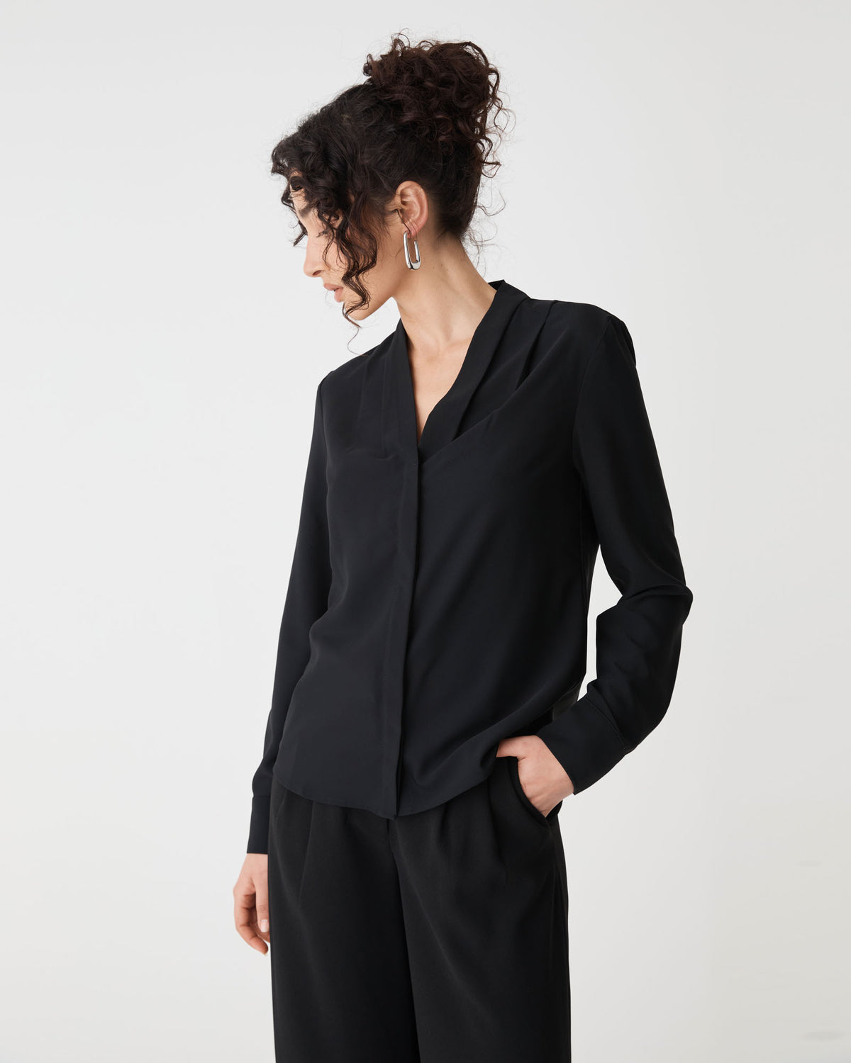 Claudia Pleat Neck Blouse in black — side view