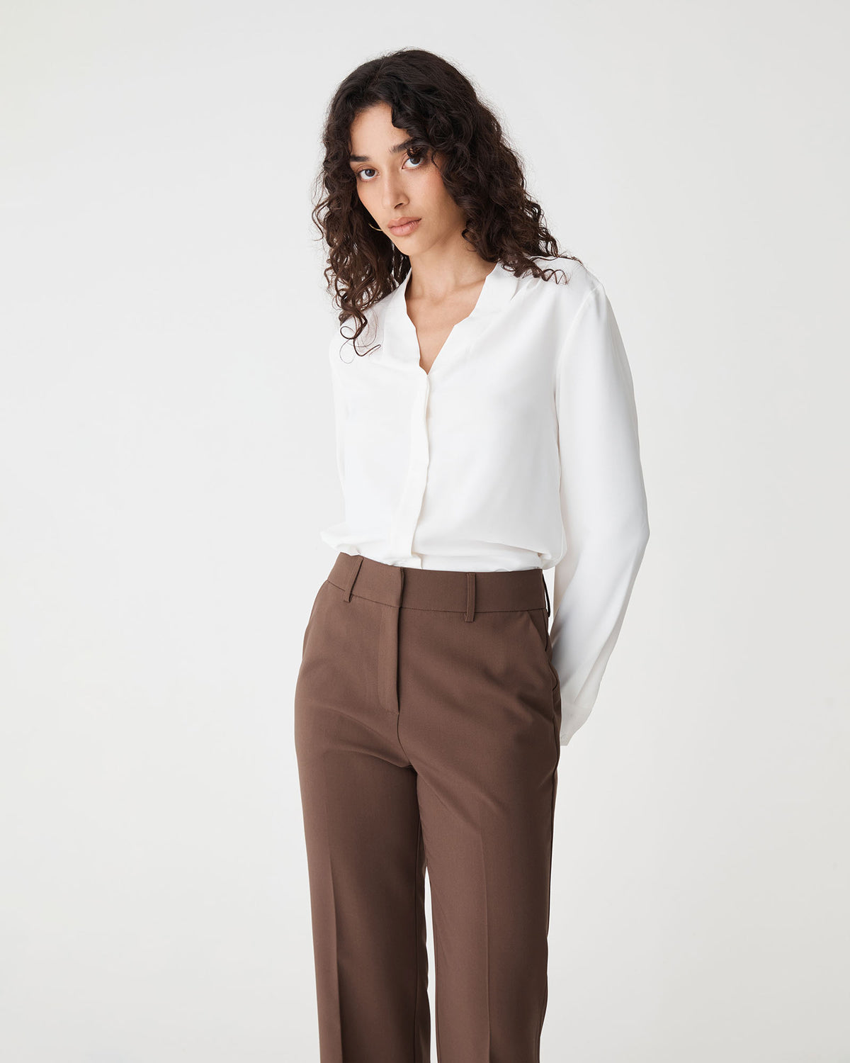 Claudia Pleat Neck Blouse in ivory — close-up view