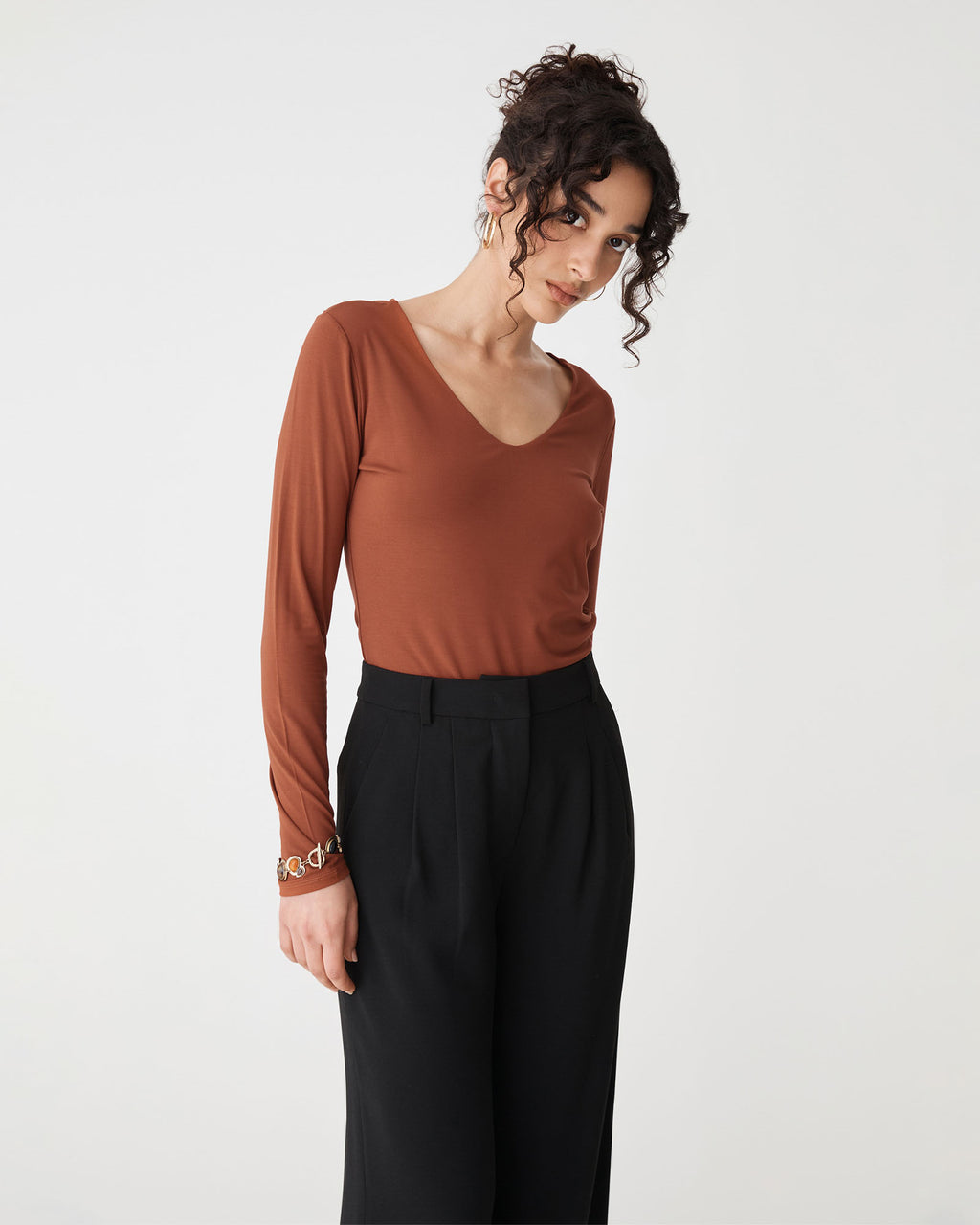 Isla V-Neck Bamboo Top in rust — close-up view