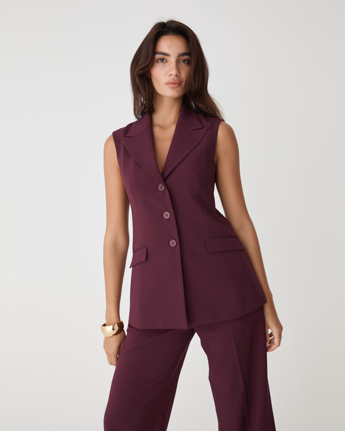 Nikki Long Collared Vest in bordeaux — close-up view