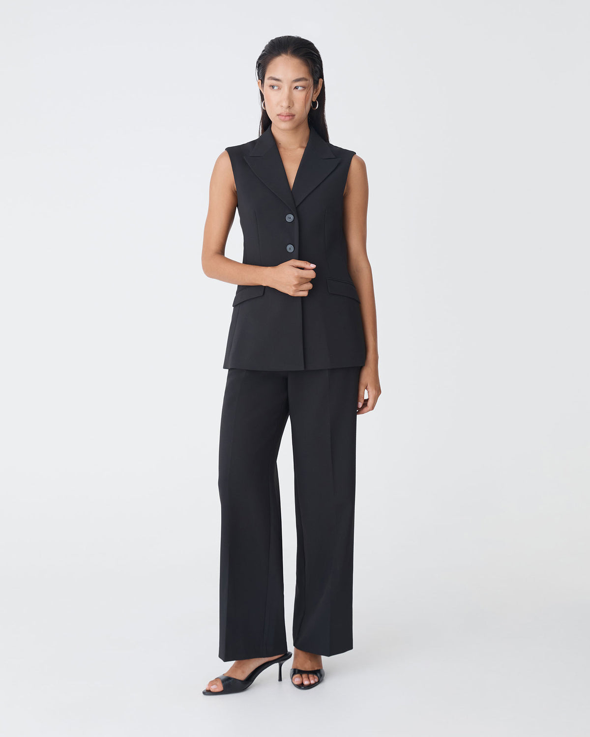 Nikki Long Collared Vest in black — full-length view 2