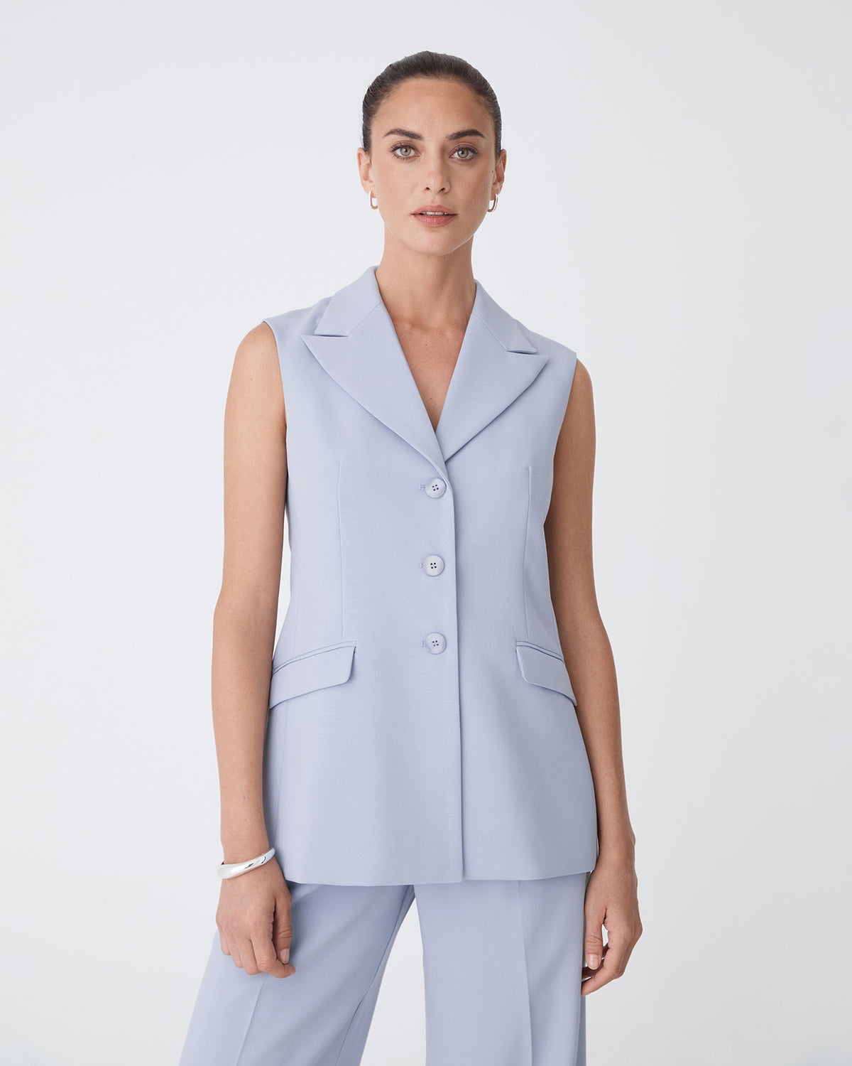 Nikki Long Collared Vest in dusk blue — close-up view