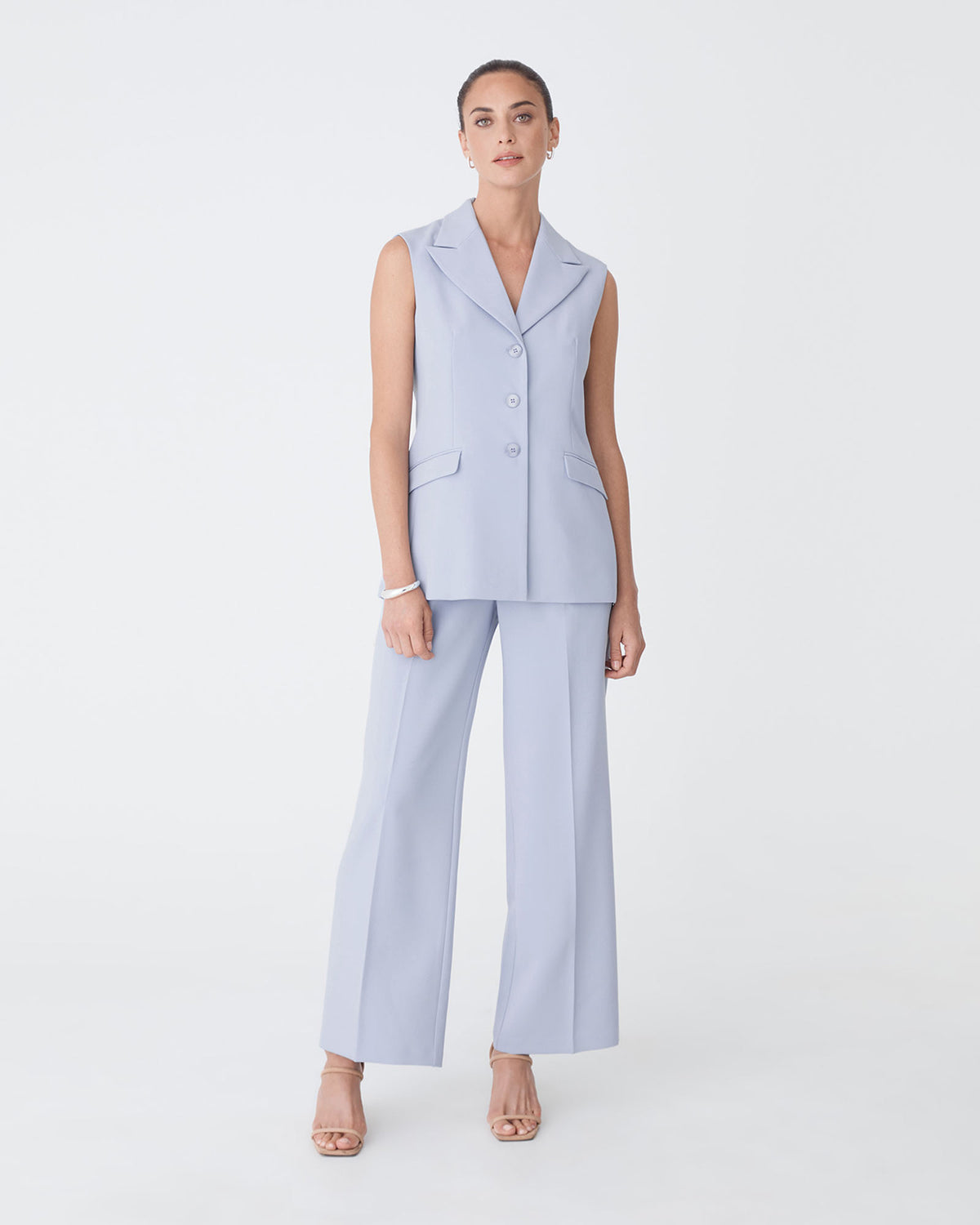 Nikki Long Collared Vest in dusk blue — full-length view