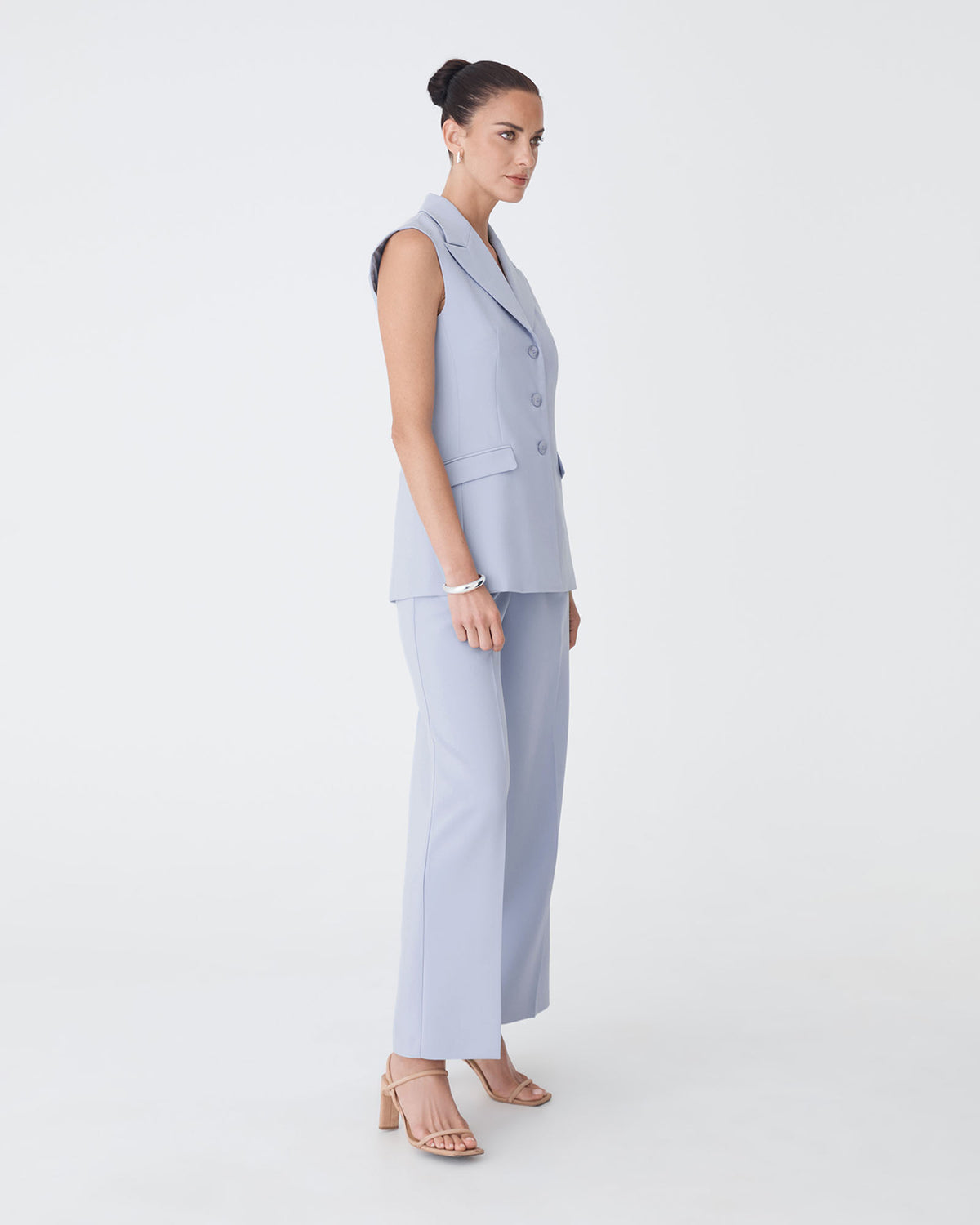 Nikki Long Collared Vest in dusk blue — side view