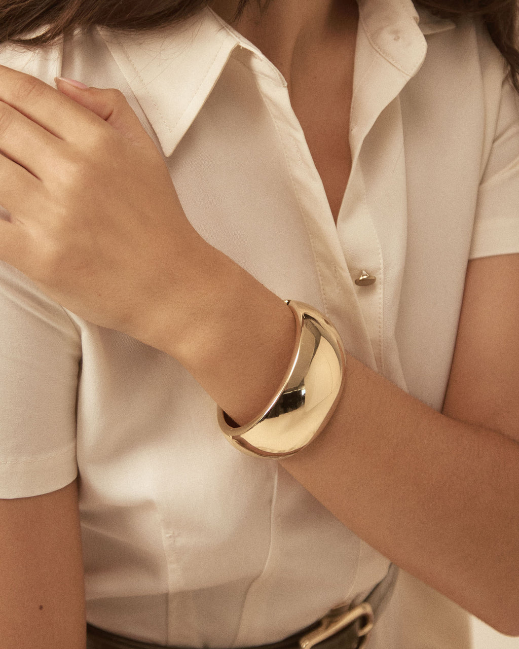 Valeria Statement Bangle in gold — close-up view