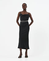 Safa Bias Slip Dress in black — full-length view