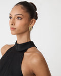 Lupita Gold Loop Earrings in gold — fabric detail