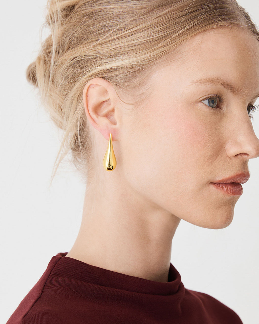 Ula Drop Earrings in gold — fabric detail