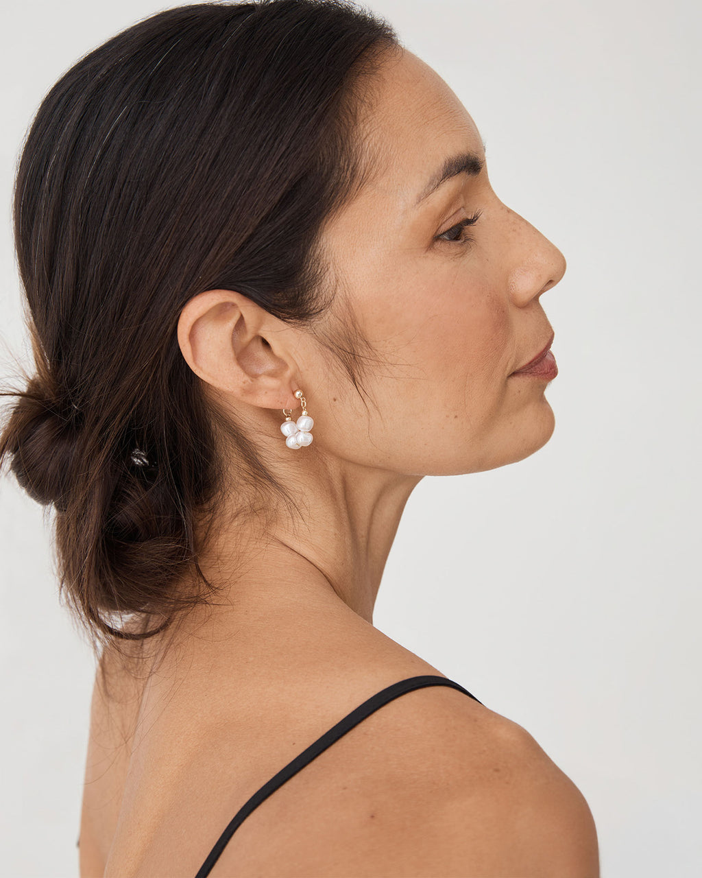 Amelie Pearl Earrings in gold pearl — fabric detail