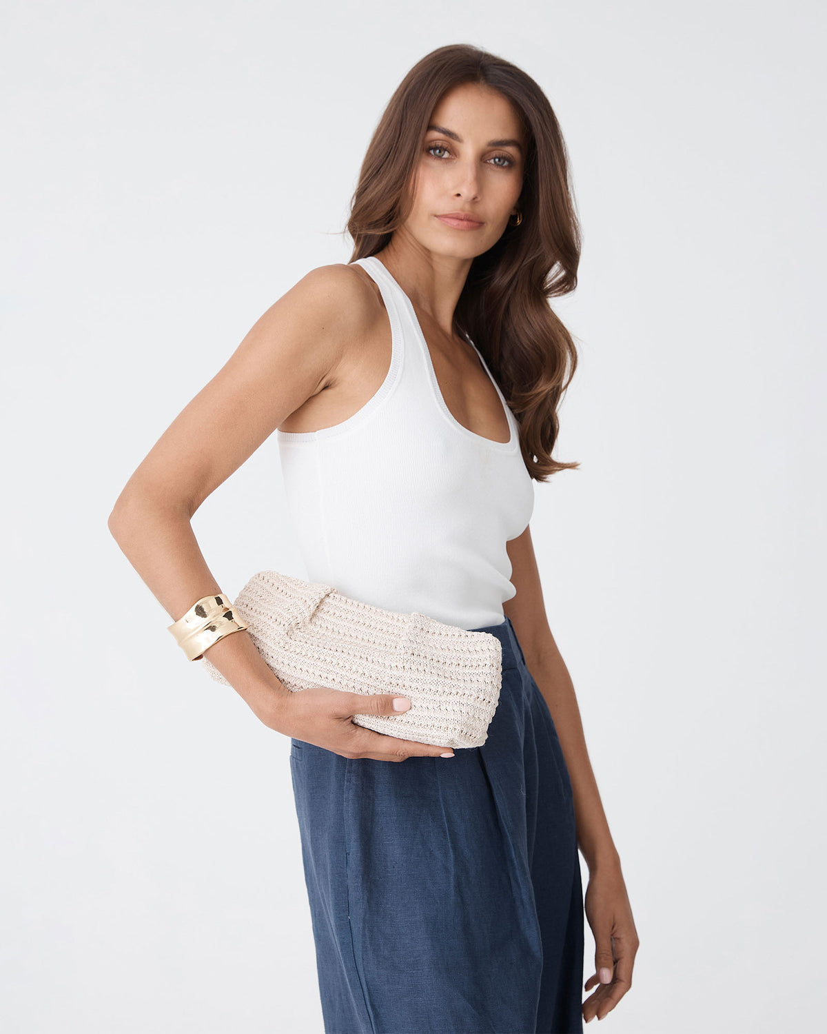 Coral Raffia Clutch Bag in ivory — close-up view
