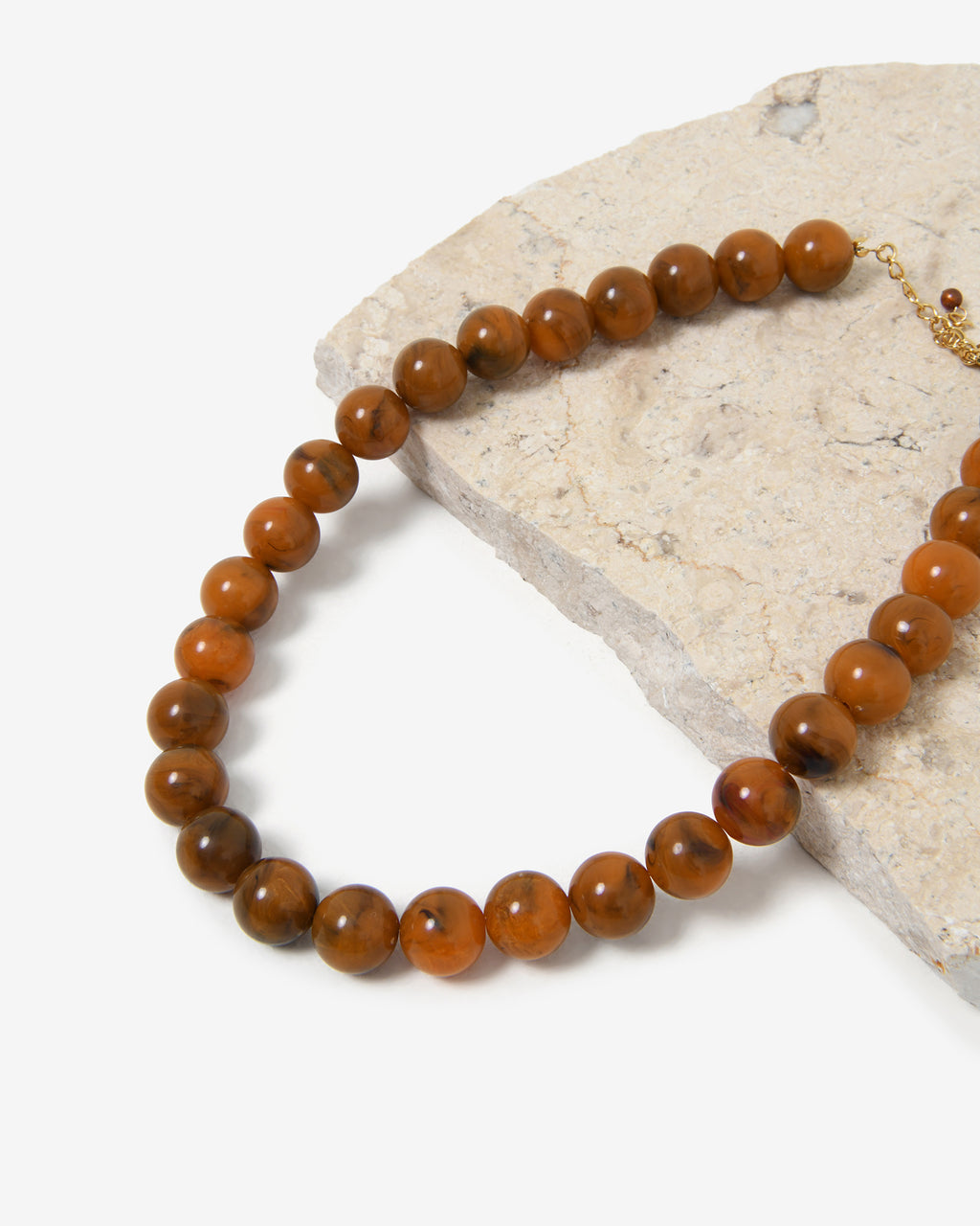 Gia Boho Resin Necklace in brown — fabric detail