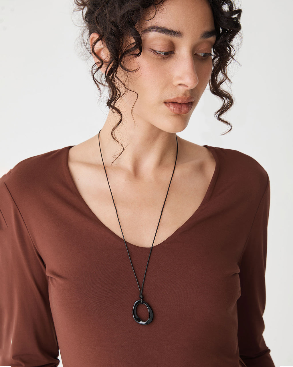 Carmen Pendant Necklace in black — fabric detail