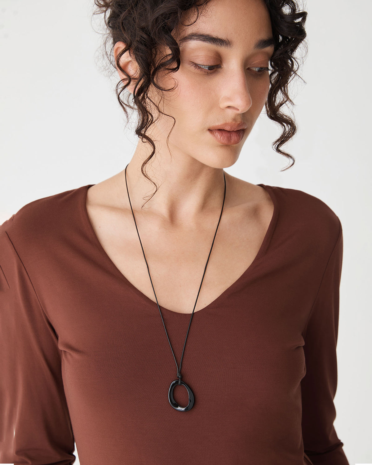 Carmen Pendant Necklace in black — fabric detail