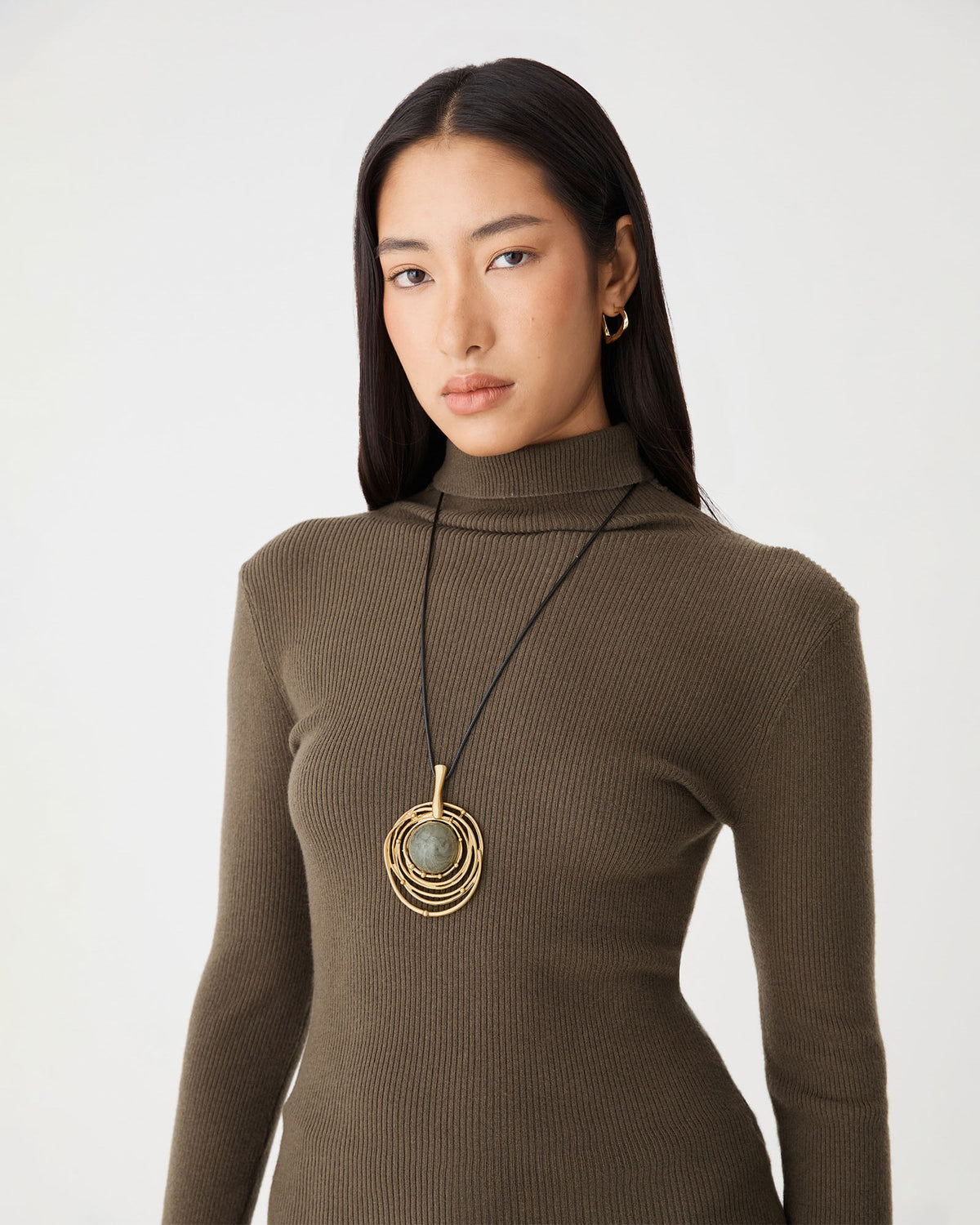 Gaia Gold Pendant in gold — close-up view