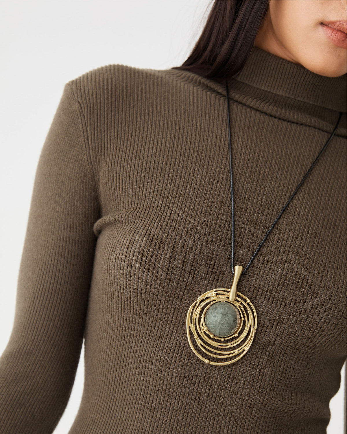 Gaia Gold Pendant in gold — fabric detail