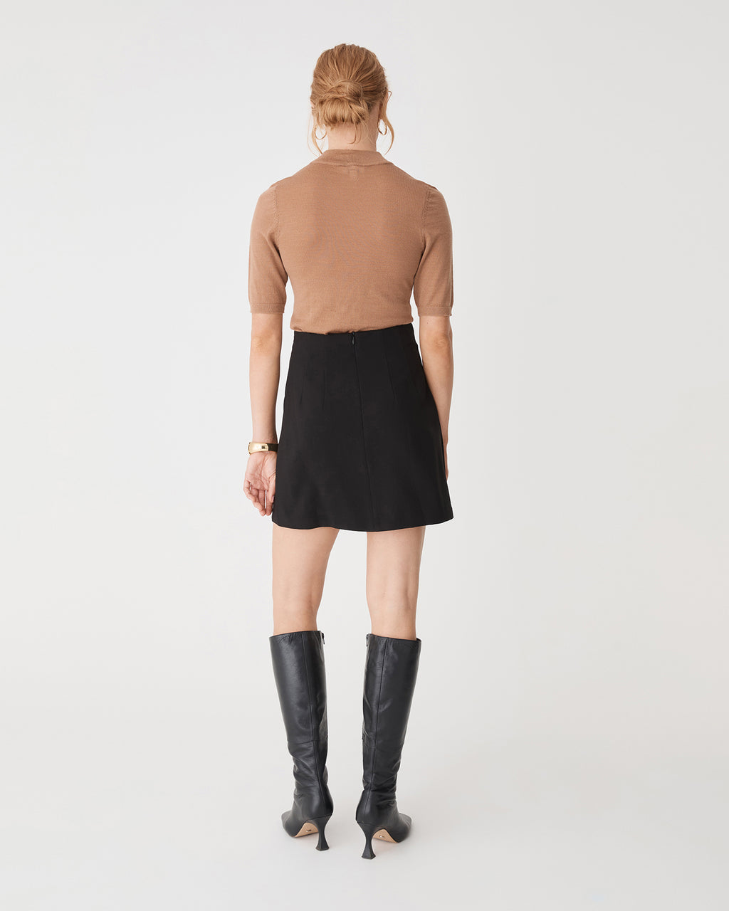 Nikki Mini Wrap Skirt in black — back view