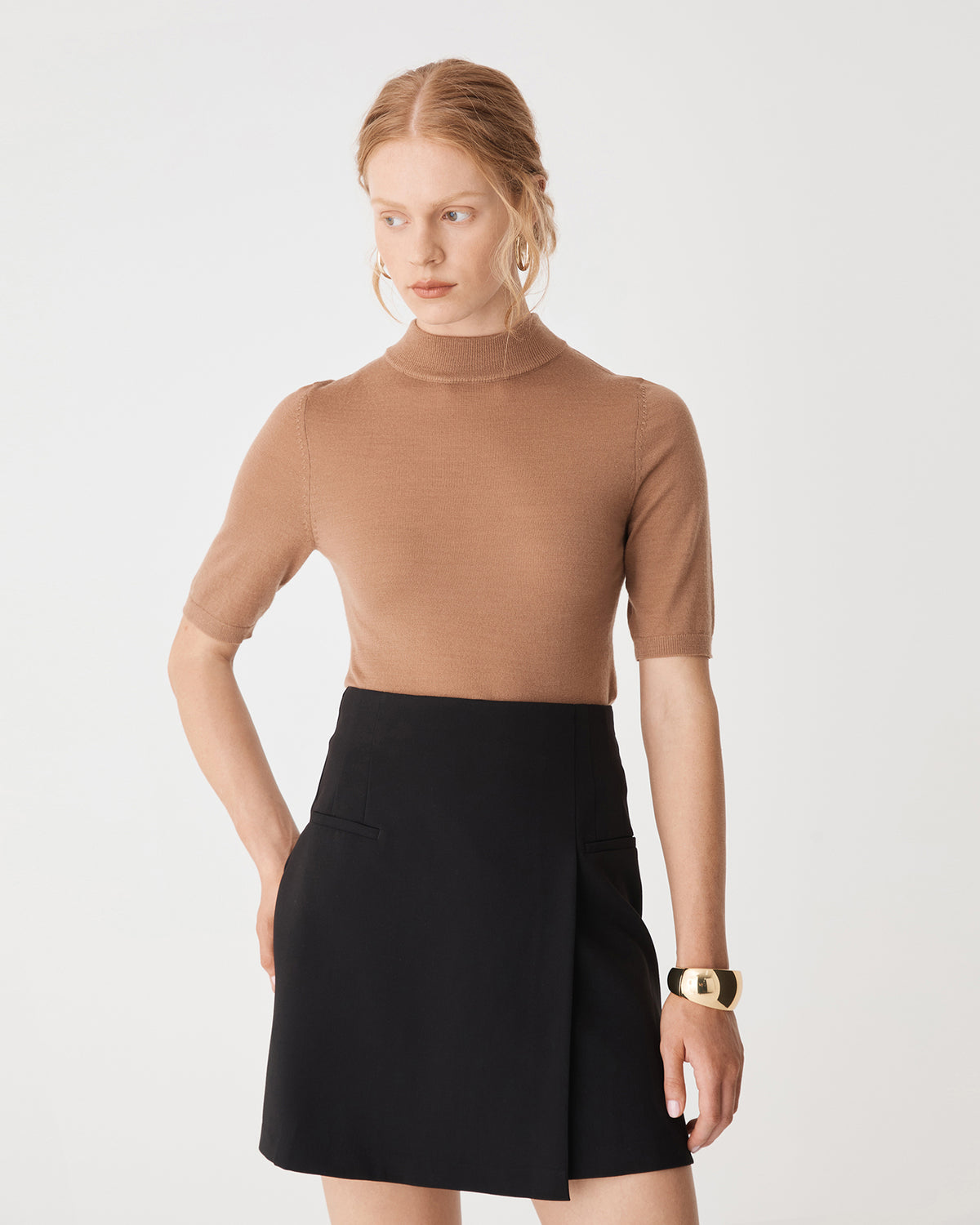 Nikki Mini Wrap Skirt in black — close-up view