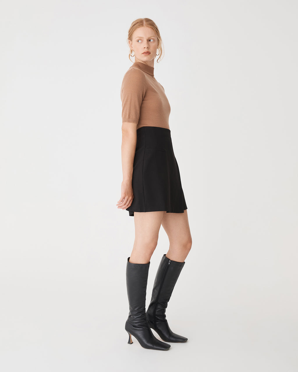 Nikki Mini Wrap Skirt in black — side view