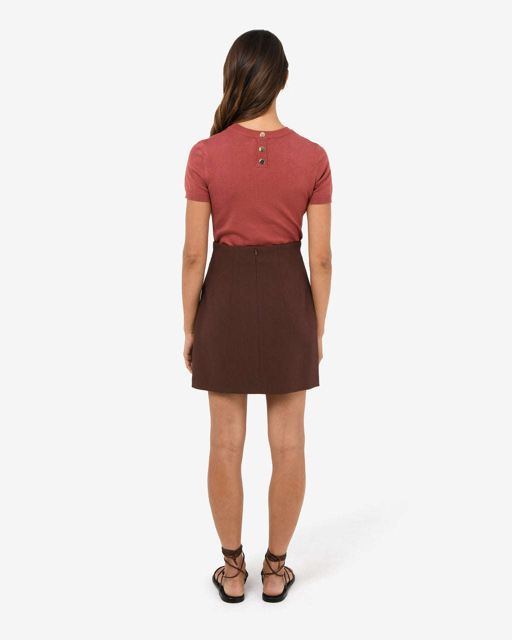 Nikki Mini Wrap Skirt in brown — back view