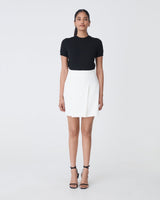 Nikki Mini Wrap Skirt in ivory — full-length view