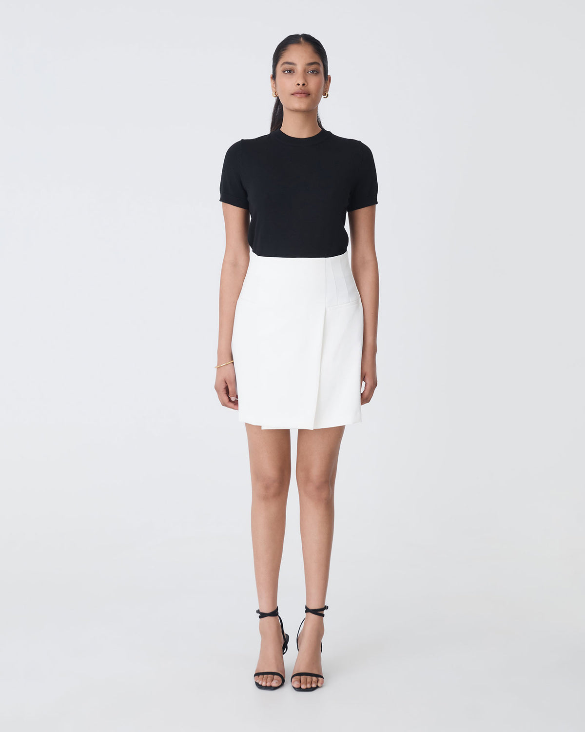 Nikki Mini Wrap Skirt in ivory — full-length view