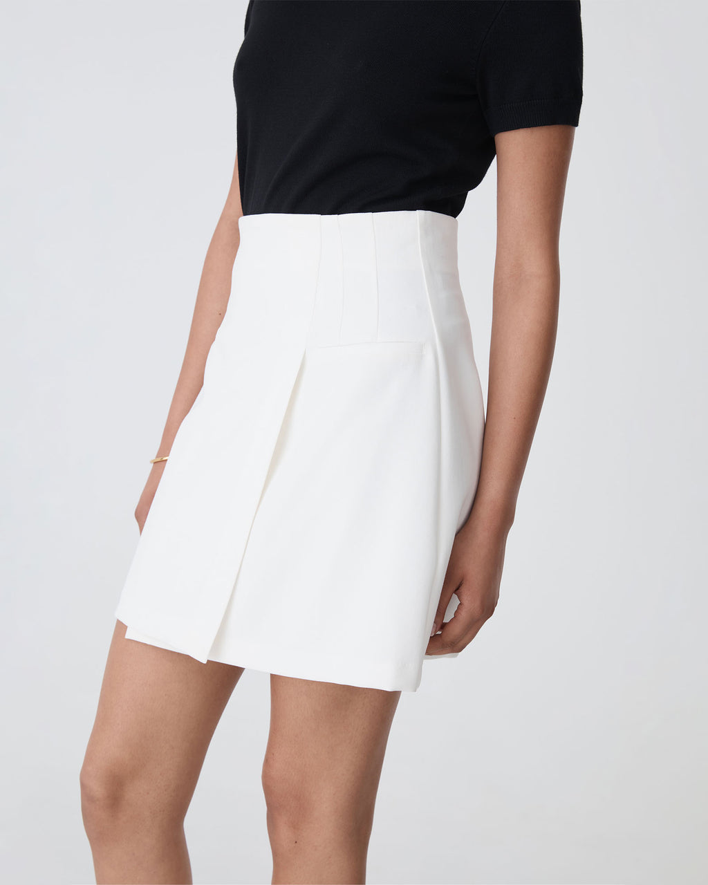 Nikki Mini Wrap Skirt in ivory — side view