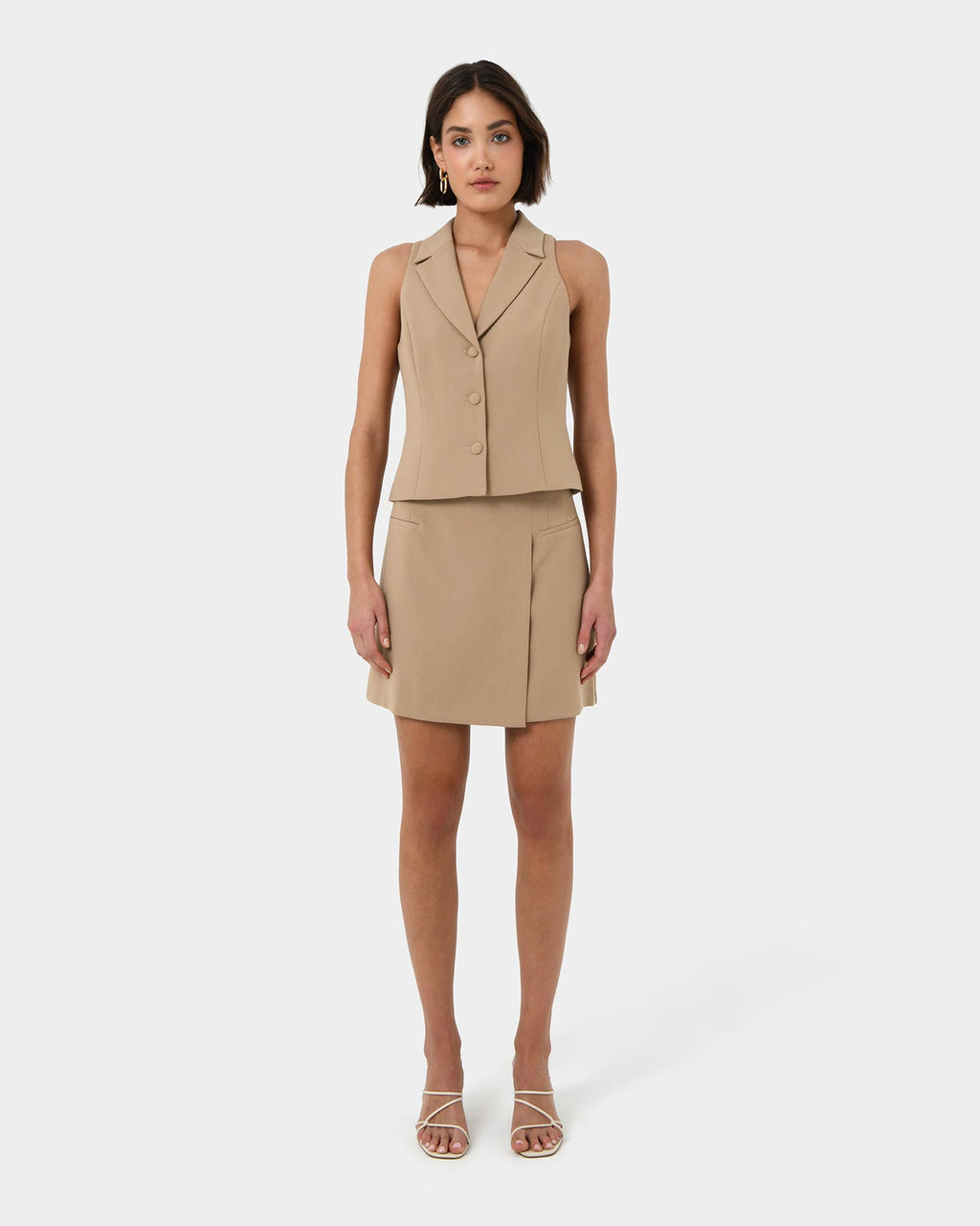 Nikki Mini Wrap Skirt in warm taupe — full-length view