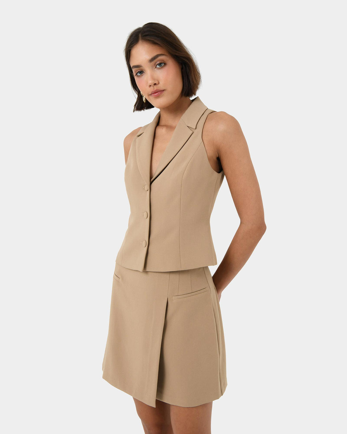 Nikki Mini Wrap Skirt in warm taupe — side view