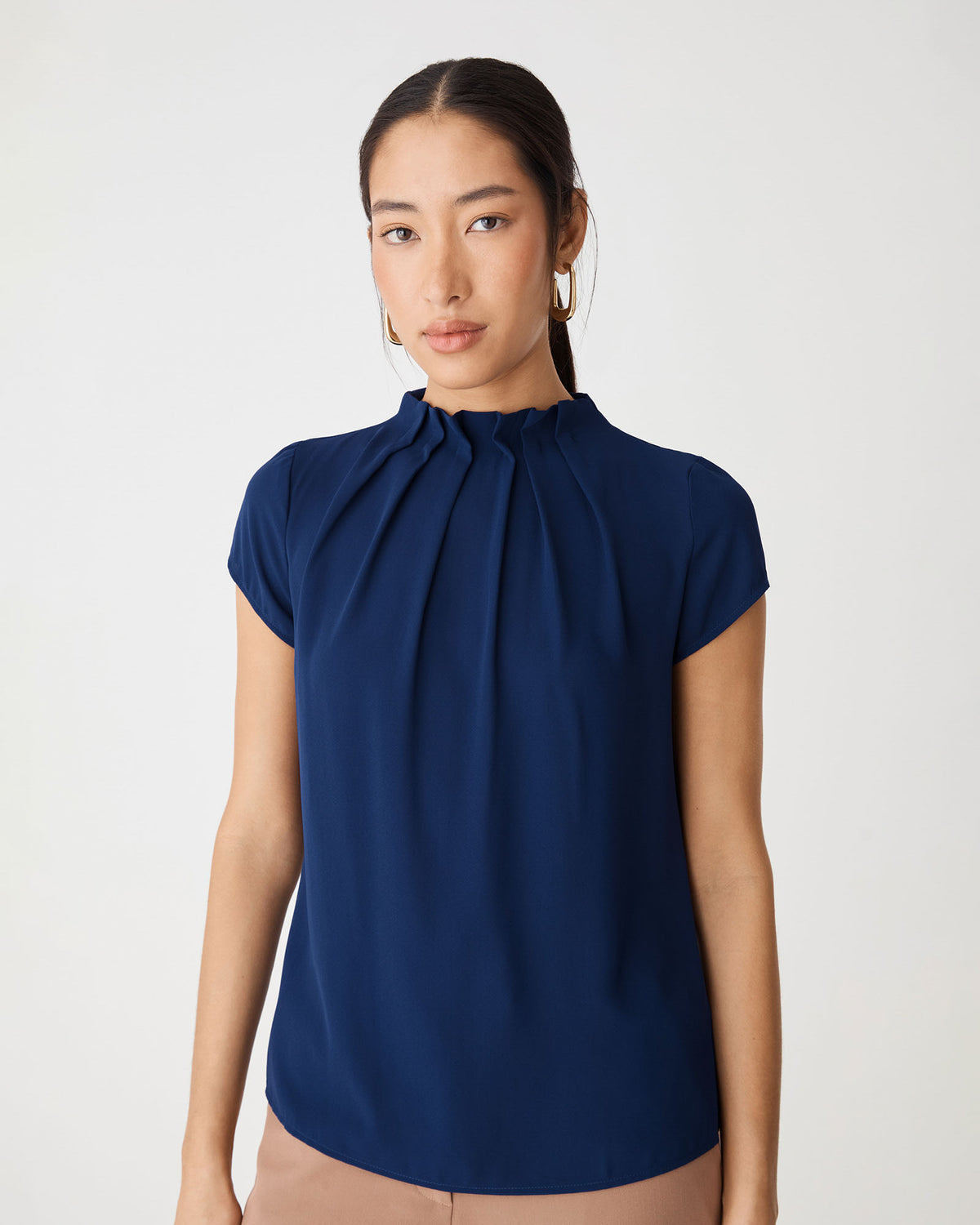 Olivia Pleated High Neck Top in navy — close-up view