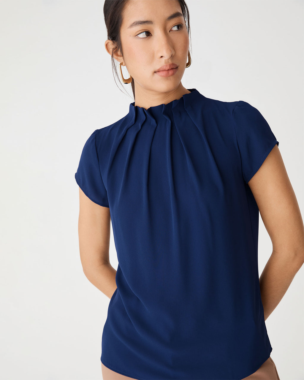 Olivia Pleated High Neck Top in navy — close-up view 2