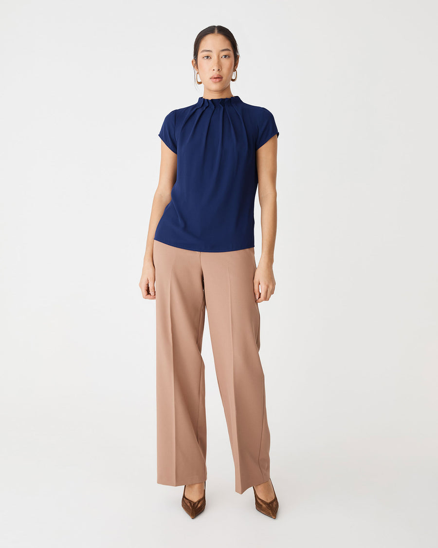 Olivia Pleated High Neck Top in navy — full-length view
