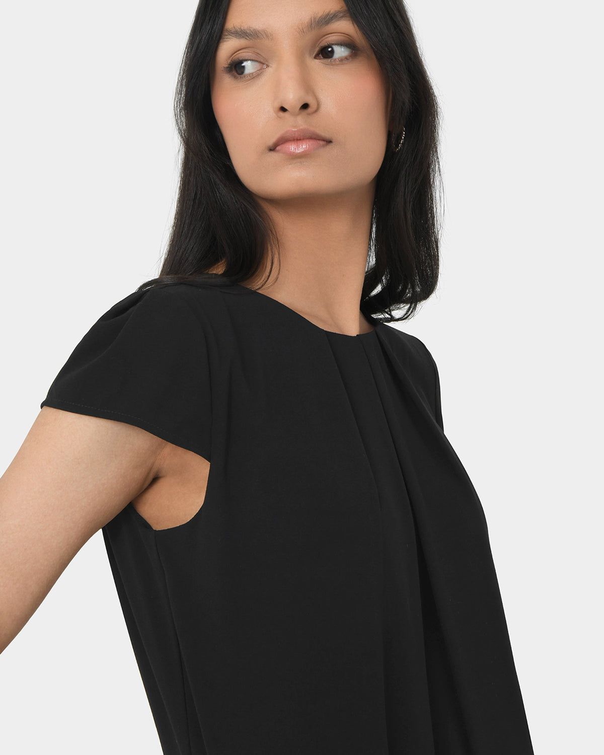 Tamera Pleated Round Neck Top in black — fabric detail